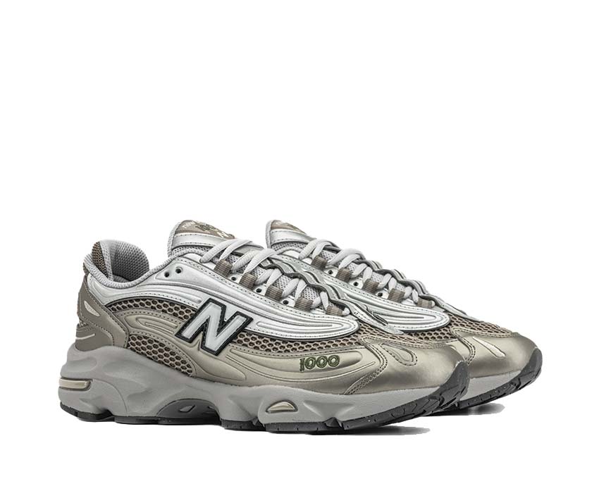 New Balance 1000 Arid Stone/Light Silver/Dark Alpine Green sole — lugged trail grip outsole