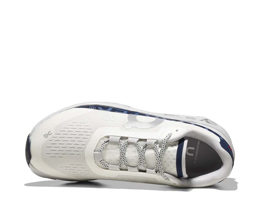 On Cloudmonster Midnight détail — tige mesh running homme