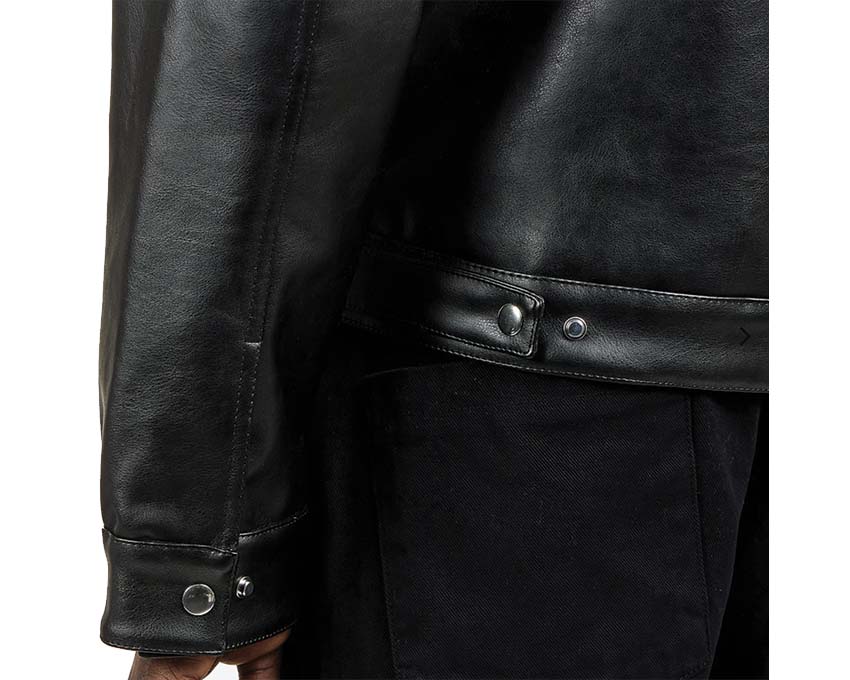 Arte Jasper Double Jacket Black détail — fermeture logo
