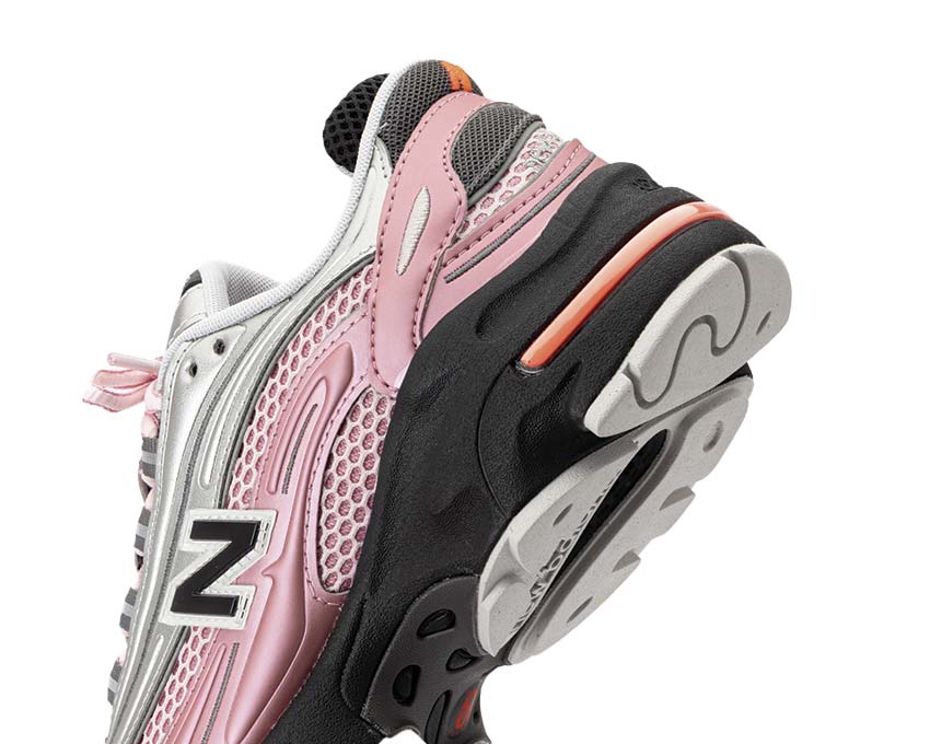 New Balance 1000 Pink Taffy Seitenansicht — Trail-Silhouette Leder Pink Taffy