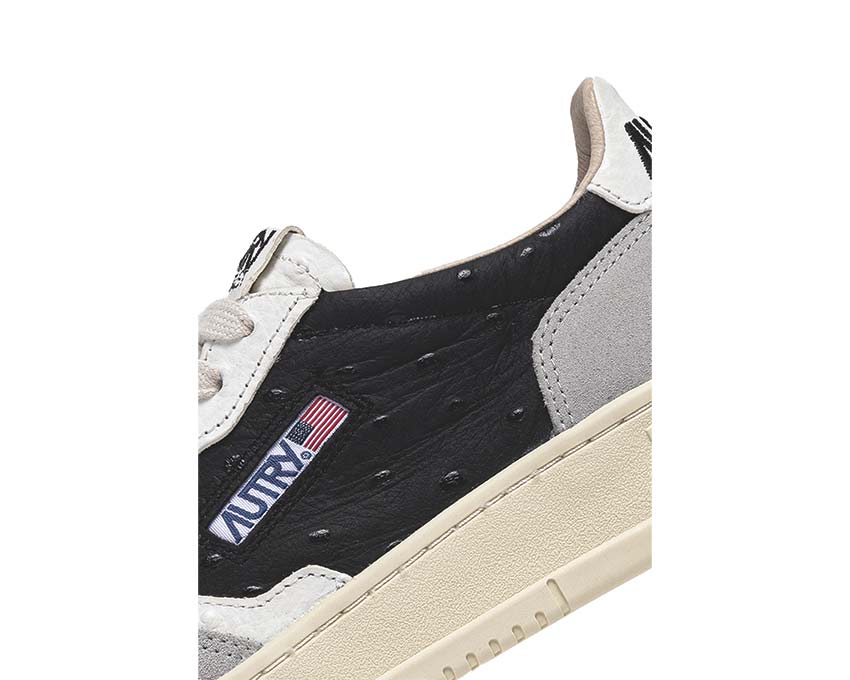 Autry Medalist Low vue latérale — cuir et daim sport rétro