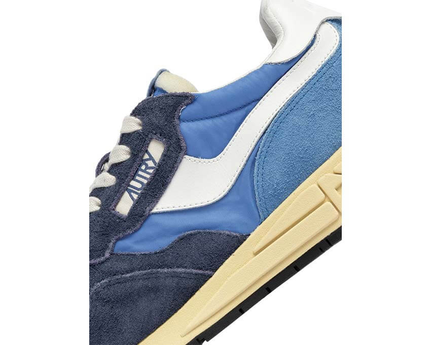 Autry Reelwind Low 3 Matières vue latérale — cuir daim et mesh tricolore