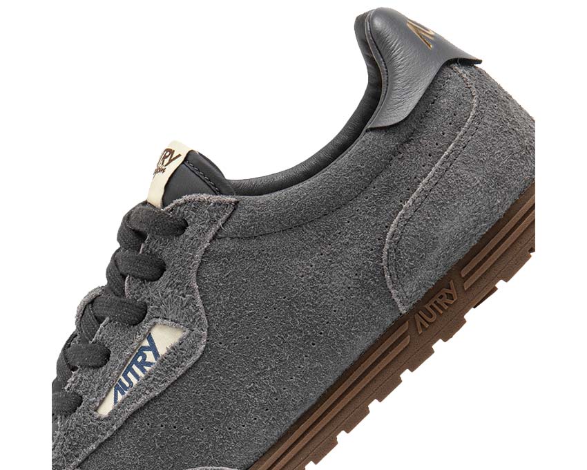 Autry Windspin Low Avion vue latérale — daim perforé bleu