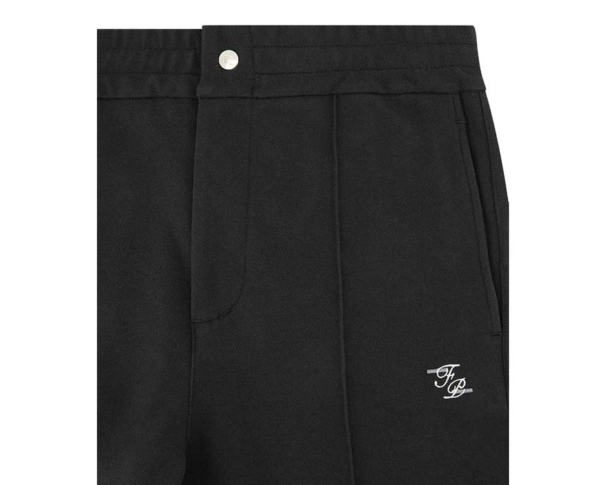 Filling Pieces Coach Pants Logo Noir vue latérale — coupe coach pantalon logo