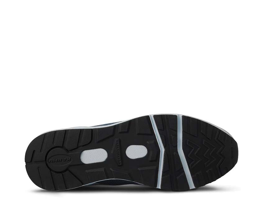 Karhu Fusion 2.0 Pearl Blue Bright Black détail — logo ours Karhu brodé bicolore