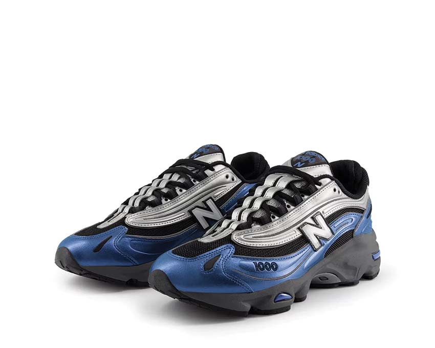 New Balance 1000 Metallic Blue lateral view — metallic sheen on upper