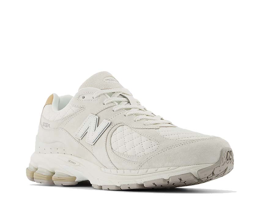New Balance 2002R Sea Salt vista laterale — tomaia mesh e pelle