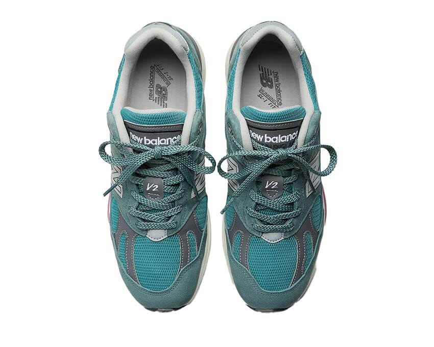 New Balance 991v2 Porcelain Green détail — empiècements tons vert céladon pastel