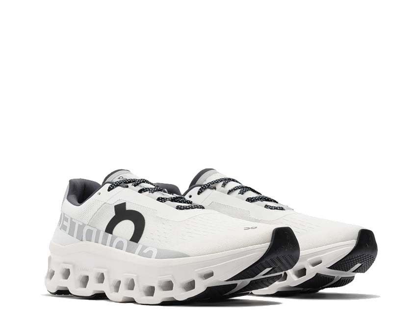 On Cloudmonster All White vista laterale — profilo ammortizzazione bianco running