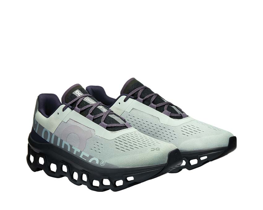 On Cloudmonster Glacier/Black vue latérale — profil amorti maximal