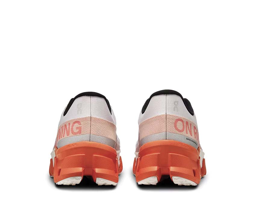 On Cloudmonster Hyper Mauve/Flame detalle — parte superior racing zapatilla hombre