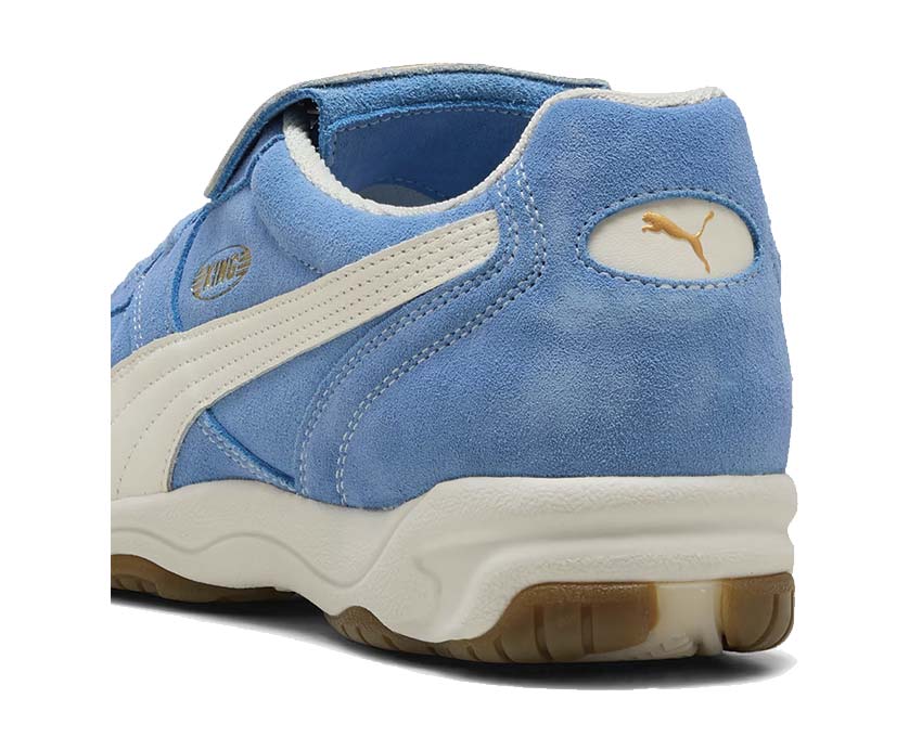 Puma King Indoor Royalty Day Dream vista laterale — pelle avorio cipriata