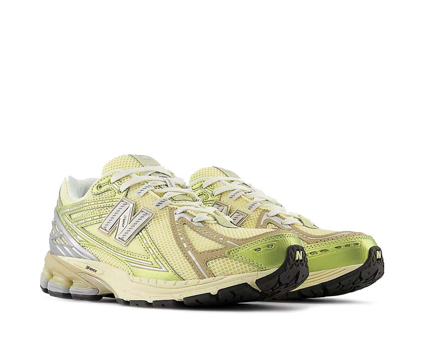 New Balance 1906R Yellow Parchment vista laterale — overlay mesh premium