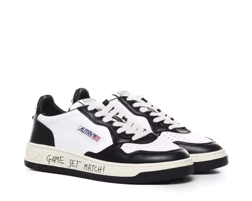 Autry Medalist Low White Black vue latérale — cuir lisse blanc et noir