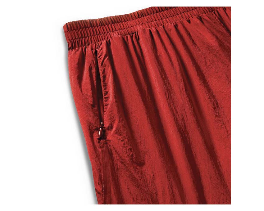 Converse ACW Wind Pant vue latérale — coupe ample nylon logo brodé ACW