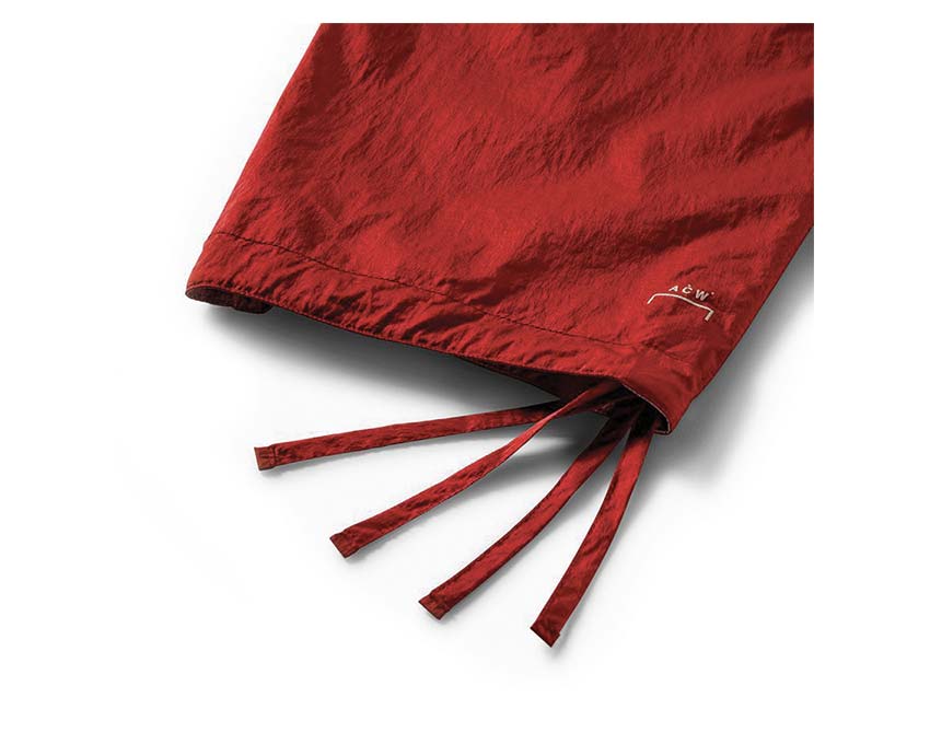 Converse ACW Wind Pant détail — logo A Cold Wall et Converse collaboration