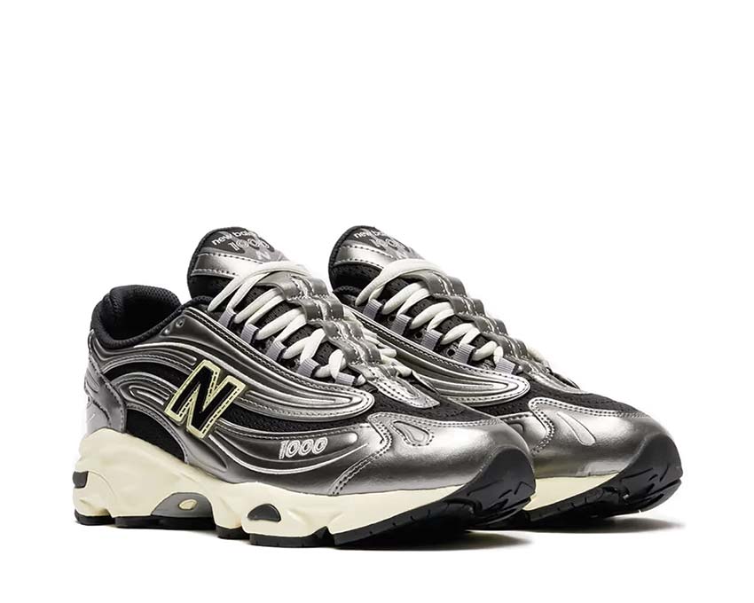 New Balance 1000 vista laterale — tomaia in camoscio e nubuck