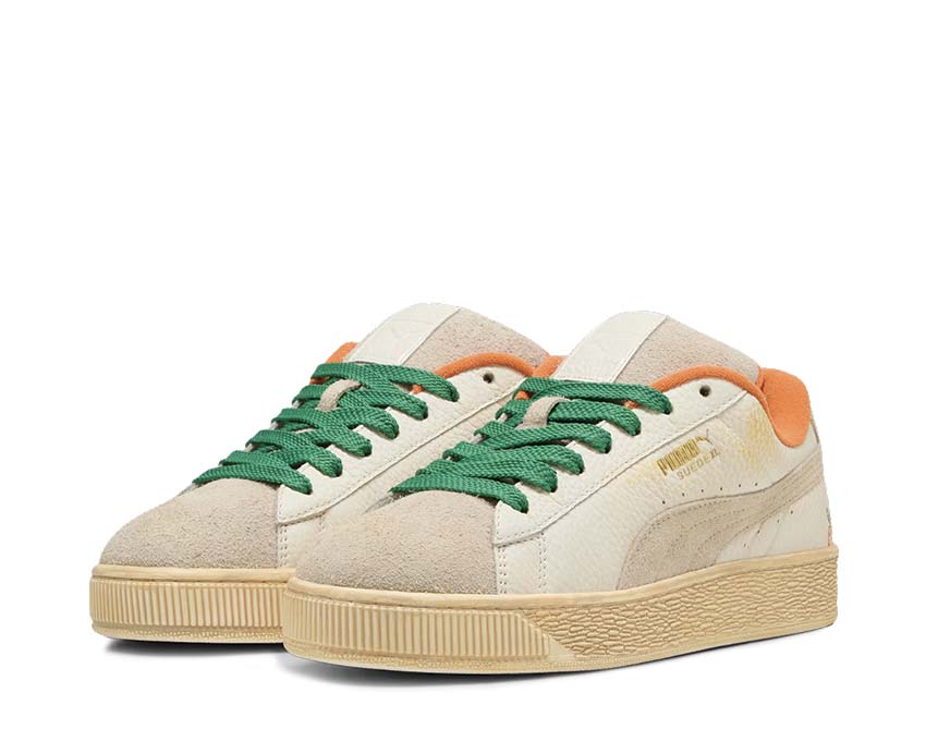 Puma Suede XL Carrots 2 Warm White Rickie Orange vue latérale — daim blanc orange carotte