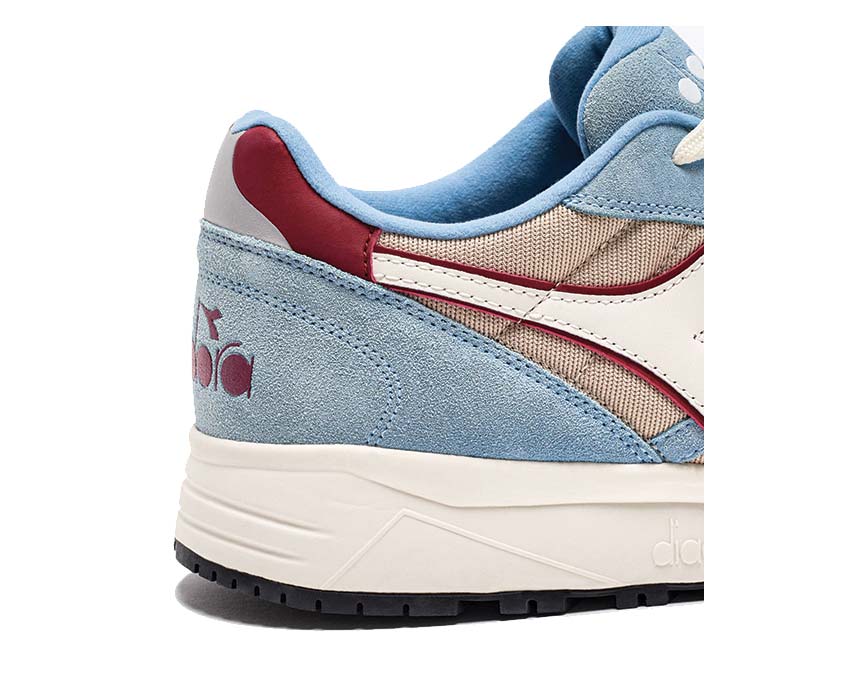 Diadora N902 Oyster Gray Dusk Blue detail — tongue logo