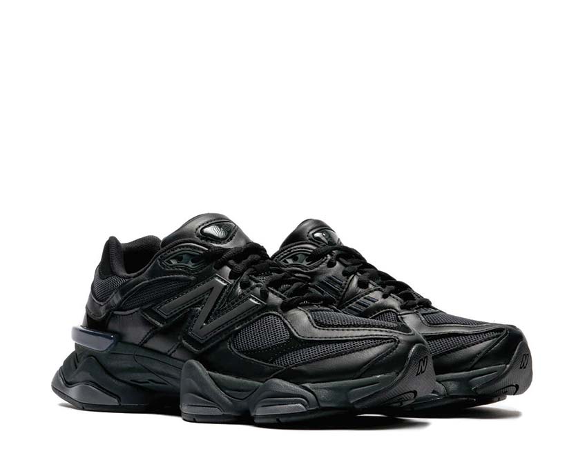 New Balance 9060 Black vue latérale — tige mesh et empiècements superposés
