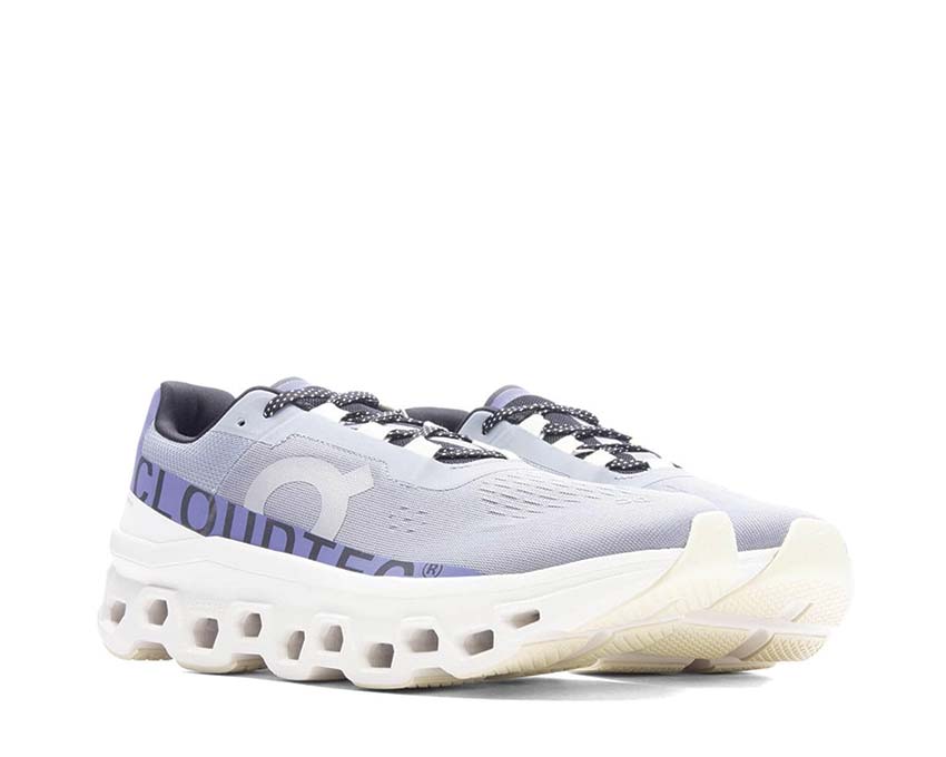 On Cloudmonster Mist Blueberry vista lateral — amortiguación CloudTec