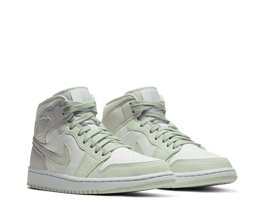 Jordan Air Jordan 1 Mid W White Spruce Aura vista laterale — pelle bianco e verde Spruce