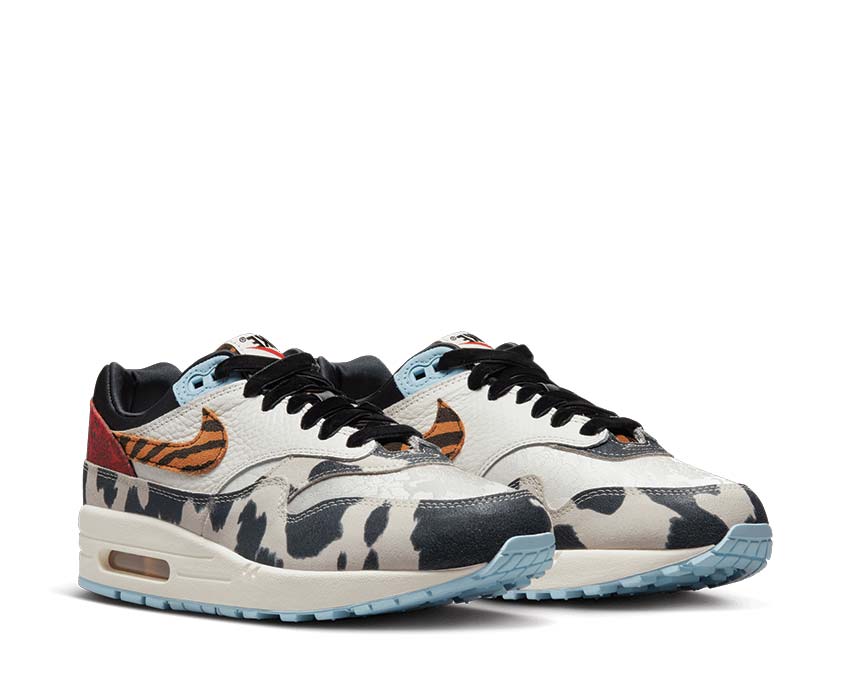 Nike Air Max 1 '87 Sail Black Celestine Blue vista laterale — pelle e scamosciato