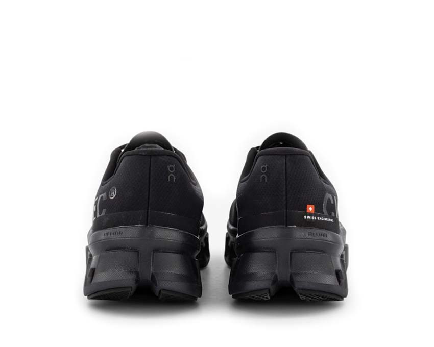 On Cloudmonster All Black vista laterale — ammortizzazione CloudTec