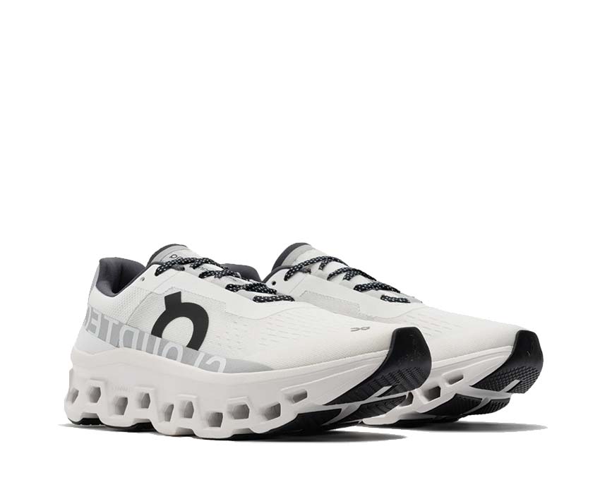 On Cloudmonster Undyed White vista laterale — ammortizzazione CloudTec
